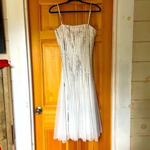 Fit and flat Caché dress